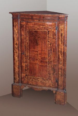 Pair of Emilia-Lombardia corner cupboards, 18th century.