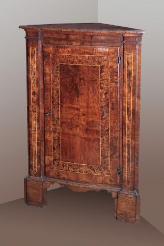 Pair of Emilia-Lombardia corner cupboards, 18th century.