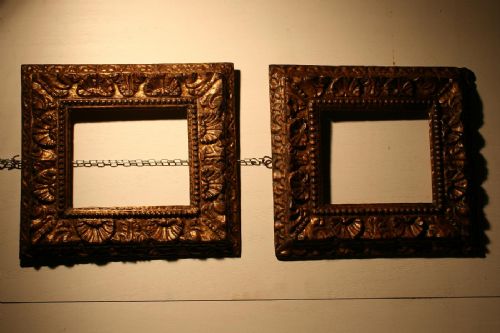 Pair of carved and gilded frames' 500